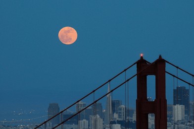 moonrise over san francisco and golden gate bridge