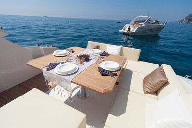 lunch on motor boat, table setting at a luxury boat.