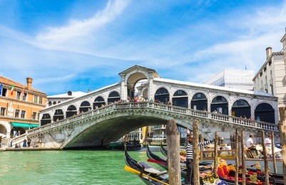 rialto bridge in venice, italy. venice grand canal. architecture and landmarks of venice. venice postcard with venice gondolas