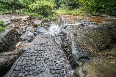kbal spean waterfall the mystery place of ancient khmer empire in siem reap, cambodia.