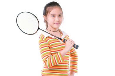 cute little girl playing badminton