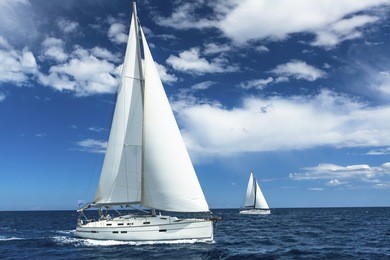 sailboats participate in sailing regatta. sailing. yachting. luxury yachts.
