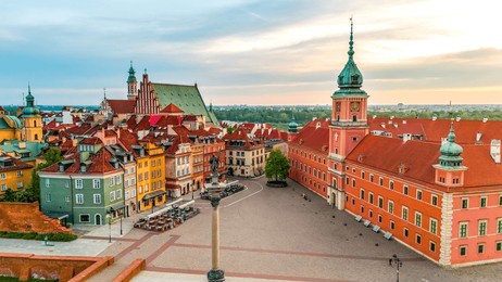 aerial view over the castle square in warsaw overlooking the old town in spring at dawn