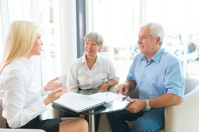 elderly couple purchasing life insurance