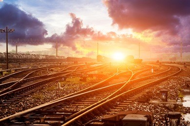 cargo train platform at sunset with container