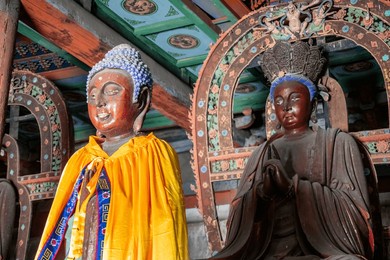 ancient buddha statue in shuanglin temple, a large buddhist temple in the shanxi province of china. founded in the 6th century, parts of unesco world heritage site. 