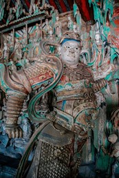ancient statues of skand (weituo) in shuanglin temple, a large buddhist temple in the shanxi province of china. founded in the 6th century, parts of unesco world heritage site. 