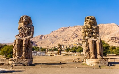 colossi of memnon (statues of pharaoh amenhotep iii) near luxor - egypt