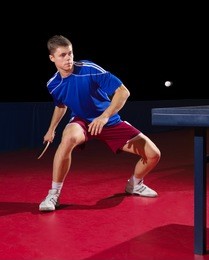 young table tennis player isolated