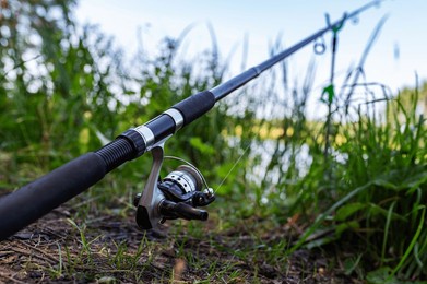 fishing blurred background. fishing rod at the lake. summer, spring, calm, mental, silence, meditation, chill, catch.