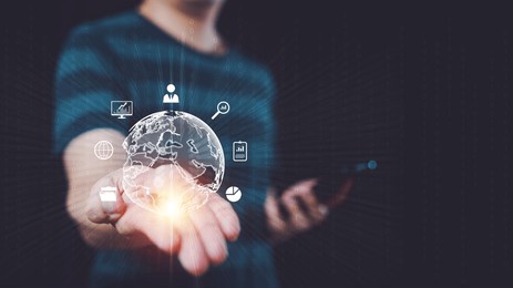 man hand holding globe diagram connected to big data around the world. concept of using the internet online networks around the world, internet of things. business online from any location.