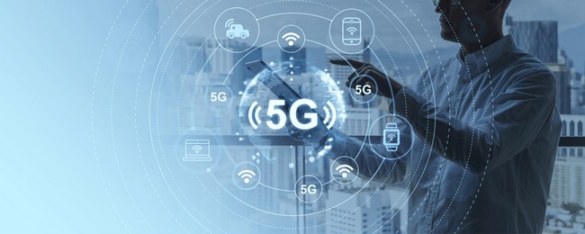 businessman using tablet, finger touching 5g icons circuit. internet of things and global connection. concept of high speed connection, smart city and global network