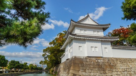 a turret in front of nijo castle in kyoto, japan 