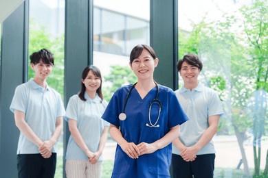 smiling doctors and medical staff