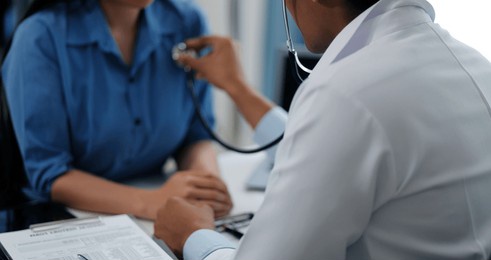 doctor using a stethoscope checking patient with examining, presenting results symptom and recommend treatment method, healthcare and medical concept.