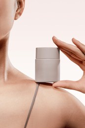 skin care products face cream on the shoulder