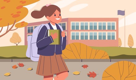cheerful schoolgirl walking to school, carrying a book and wearing backpack, with the school building and fall foliage