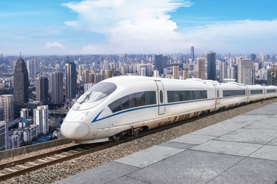 high-speed train gliding through an urban landscape  