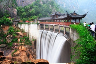 chinese temple with waterfall in taizhou,zhejiang,china