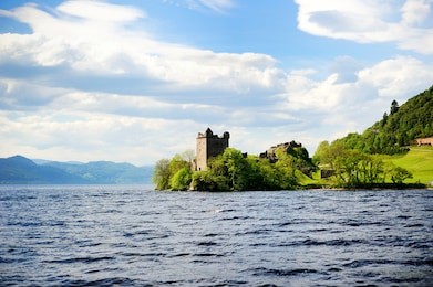view of urquhart castle and loch ness in the highlands of scotland