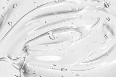 gel texture. clear liquid cosmetic background. skincare serum, beauty cream with bubbles closeup