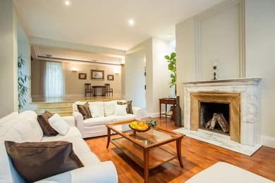view of living room with classic fireplace