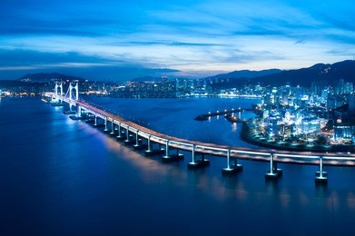 looking over busan diamond bridge from top of a building.