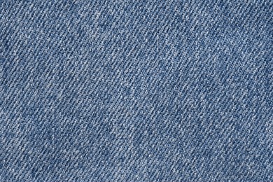 macro blue denim texture, blue denim texture as background close up photo from above 