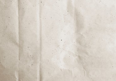 creased recycled paper. crumbled paper texture with dust and scratches