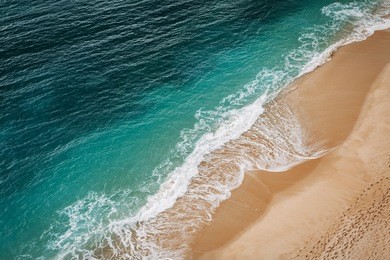 wave on the navy beach (praia da marinha), located on the atlantic coast in caramujeira, lagoa municipality, algarve.