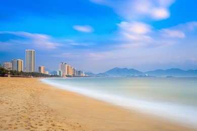 long exposure of nha trang city beach, vietnam. early morning