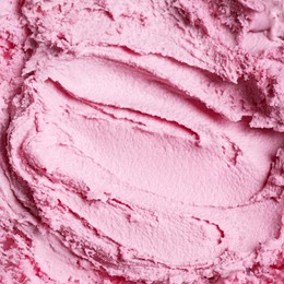 pink strawberry or blueberry ice cream texture, full frame background. close up of italian berry ice cream, gelato or frozen yogurt.