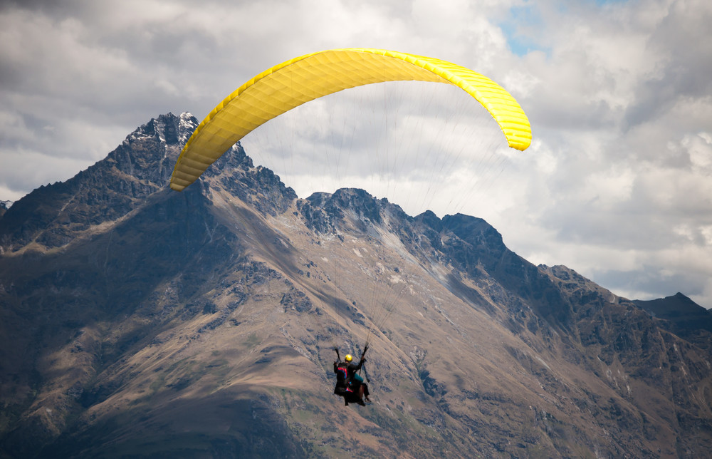 paragliding over the city of bernal, new zealand