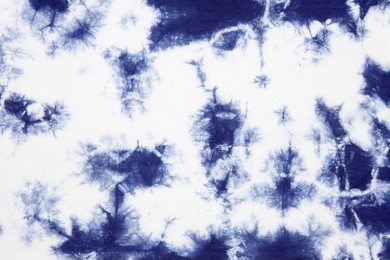 abstract tie dyed fabric background 