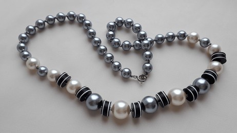 vintage pearls, beads in necklaces, beads. mother-of-pearl vintage jewelry. pearl light gray beads.