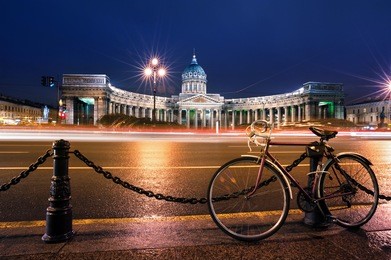 bicycle over kazan cathedral on nevsky prospect, st. petersburg,