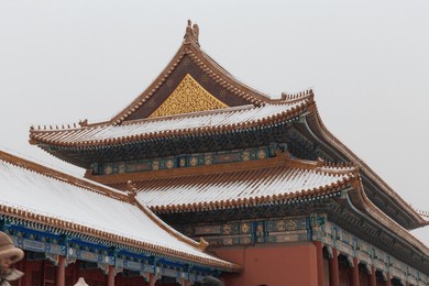 forbidden city in snow of beijing, china