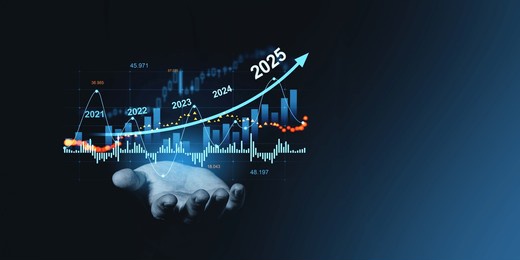 a hand holds a financial graph displaying upward market trends from 2021 to 2025 with candlestick patterns, on a dark background, symbolizing financial forecasting and future growth