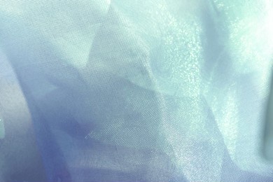 texture, background, pattern. silk fabric in light grey blue as background. abstract folds.
smooth elegant color silk or satin texture. turquoise, blue, green, teal, aquamarine, mint green, cyan blue