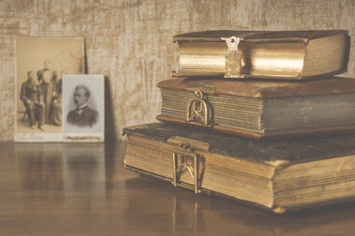 albums for photos and old photos in the background