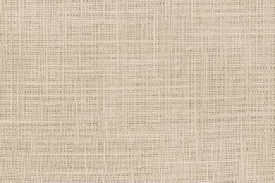 brown linen fabric cloth texture for background, natural textile pattern.