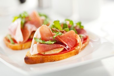 bruschetta with parma ham and parmesan cheese