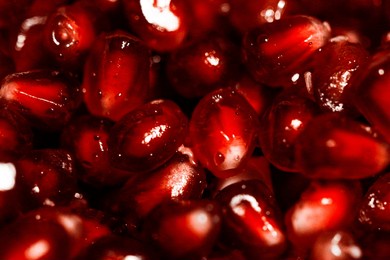 juicy fruit pomegranate close up. red and glossy fruit 