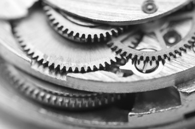 black and white background with metal cogwheels a clockwork. conceptual photo for your successful business design. macro.