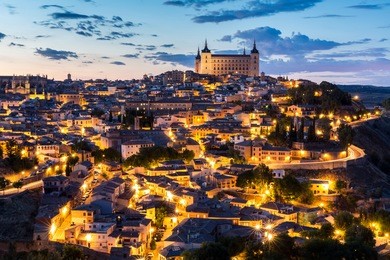 toledo cityscape with alcazar at dusk in madrid spain