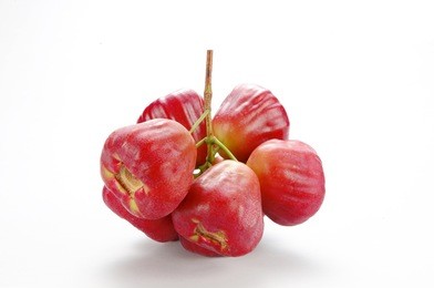 a bunch of wax apple, (bell fruit, bell apple, java apple)