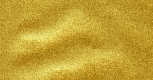 yellow golden texture with glitter background. metal gold. shiny gold foil background texture