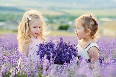 two happy girls in lavender field