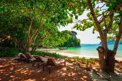 quiet place with beach chairs to enjoy the view at railay beach, ao nang, thailand