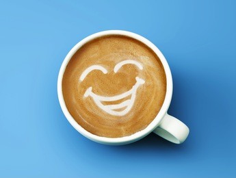 face laughing coffee cup concept isolated on cyan background